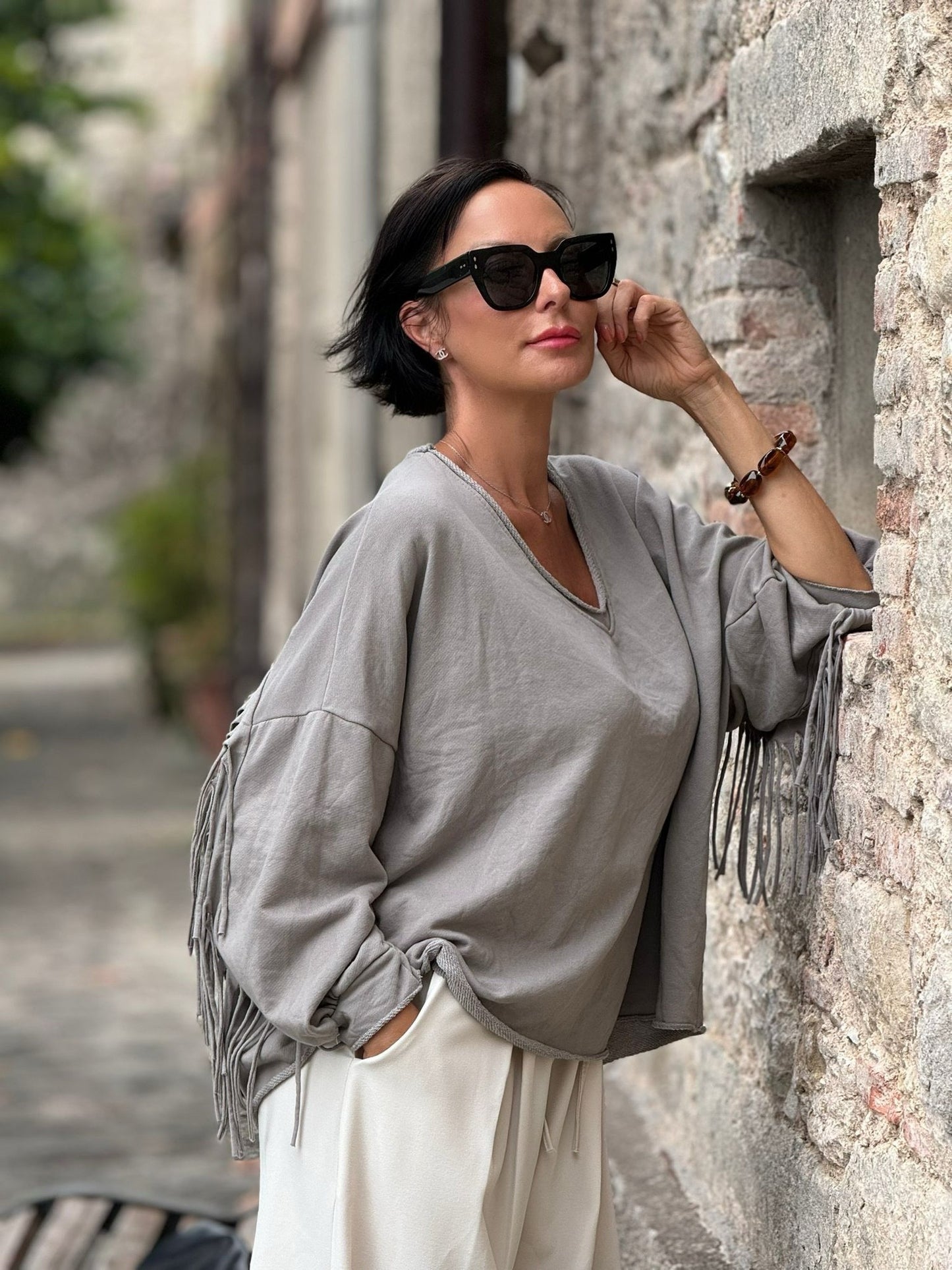 Sweater Elara franjes taupe