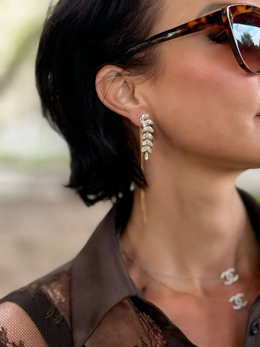 Earrings slinger feather